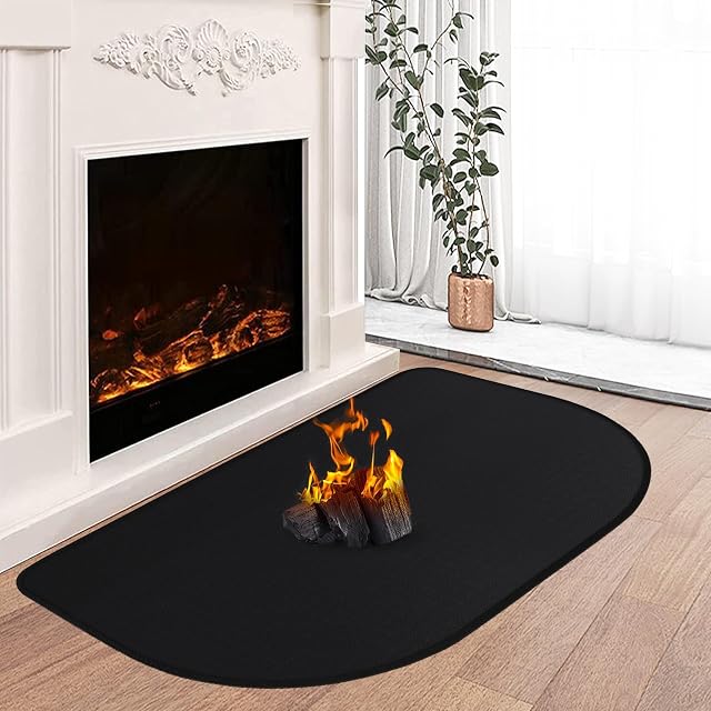 Un sottile tappetino antiscintille nero pieghevole in fibra di vetro rivestita di silicone, di ottanta per cinquanta centimetri